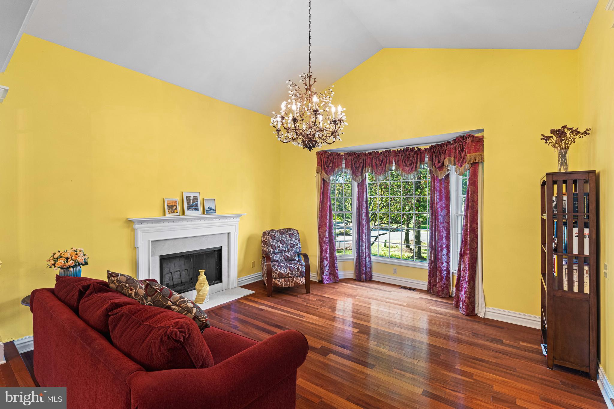 6 Howell Court Princeton Junction, NJ 08550 - Photo 22 of 81 a living room with furniture a fireplace and a flat screen tv