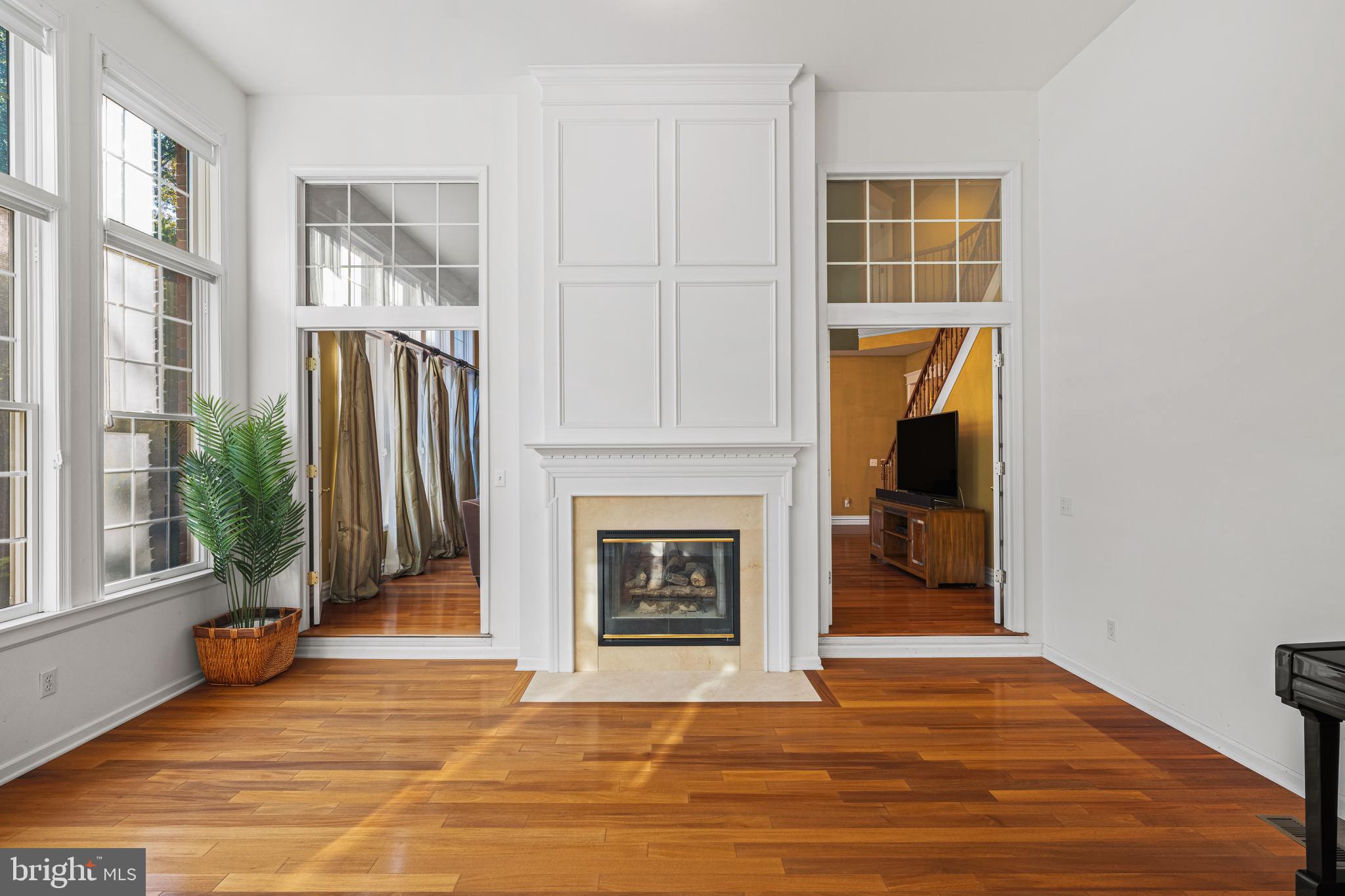 6 Howell Court Princeton Junction, NJ 08550 - Photo 35 of 81 a view of an empty room with a fireplace and a window