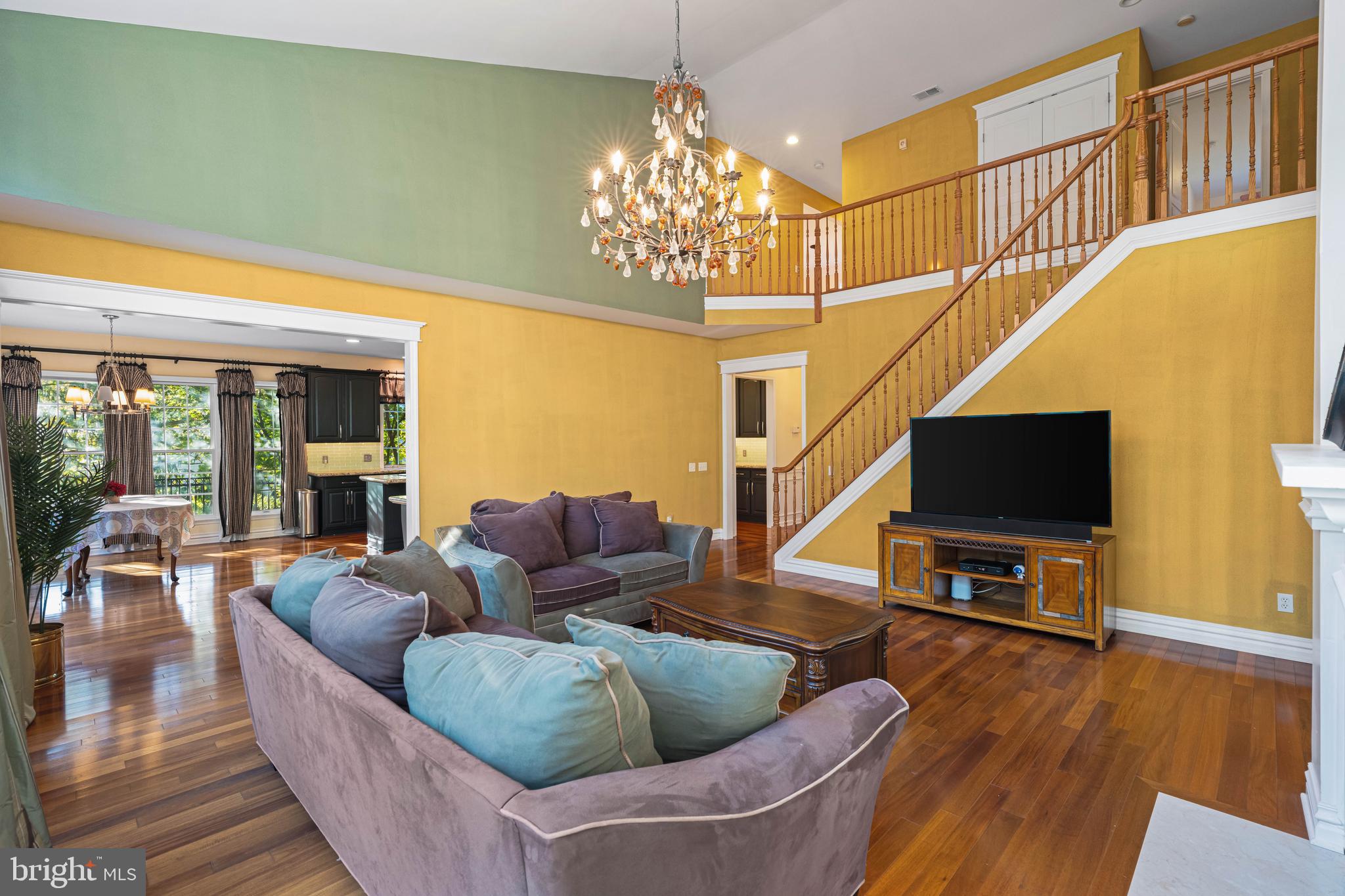 6 Howell Court Princeton Junction, NJ 08550 - Photo 40 of 81 a living room with furniture and a flat screen tv