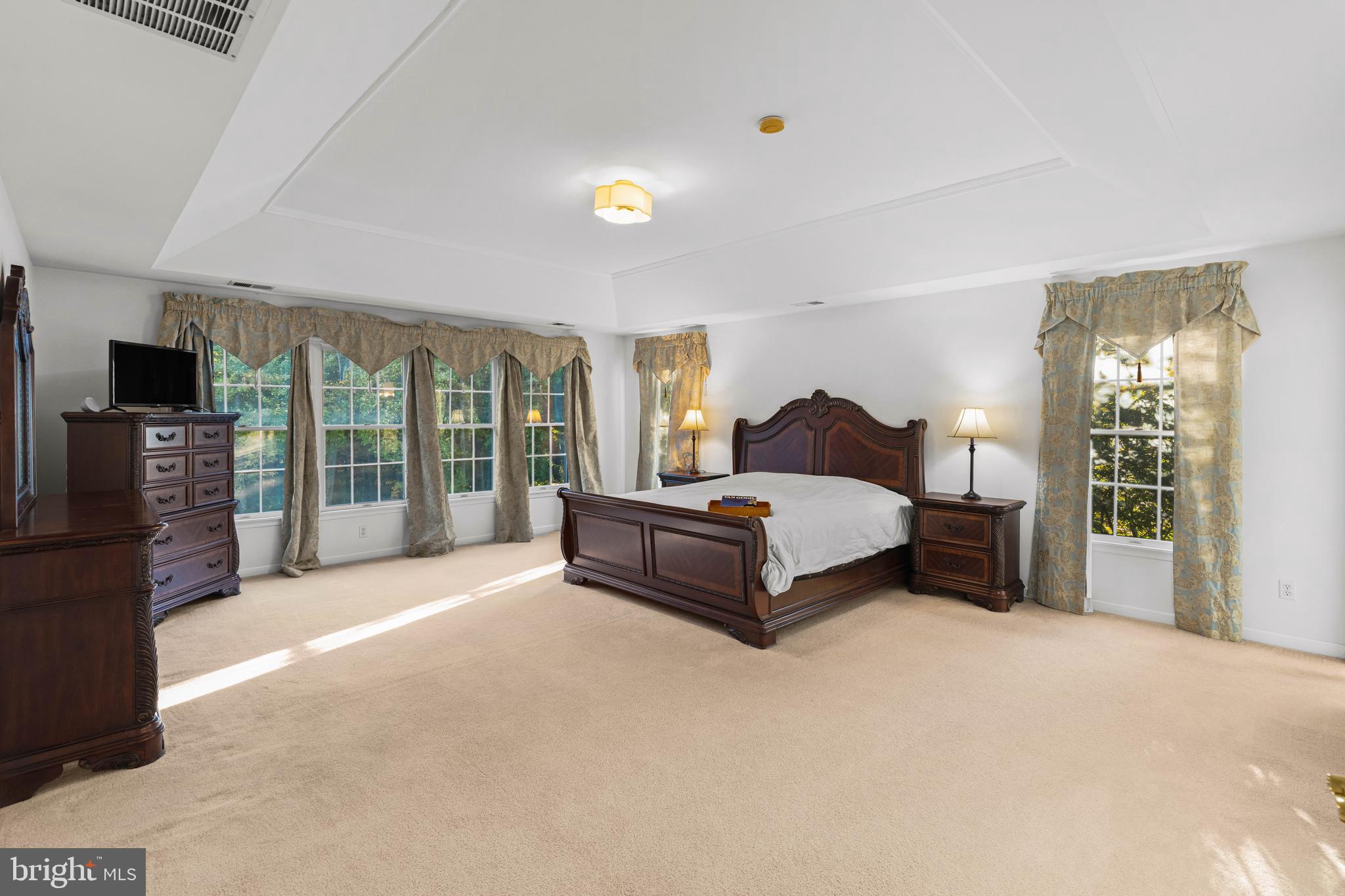 6 Howell Court Princeton Junction, NJ 08550 - Photo 51 of 81 a spacious bedroom with a bed and large trees