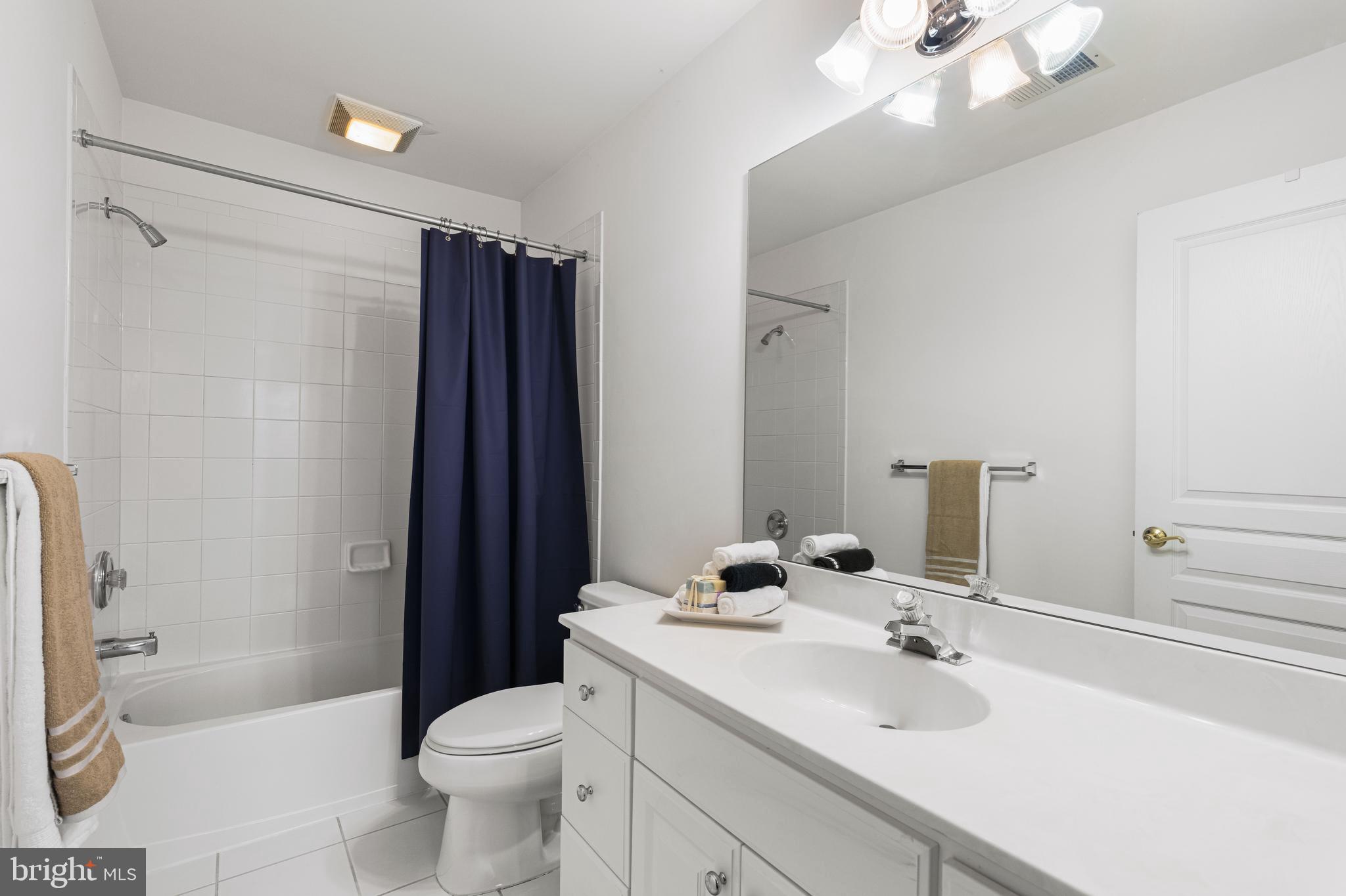 6 Howell Court Princeton Junction, NJ 08550 - Photo 60 of 81 a bathroom with a sink vanity granite toilet and a mirror