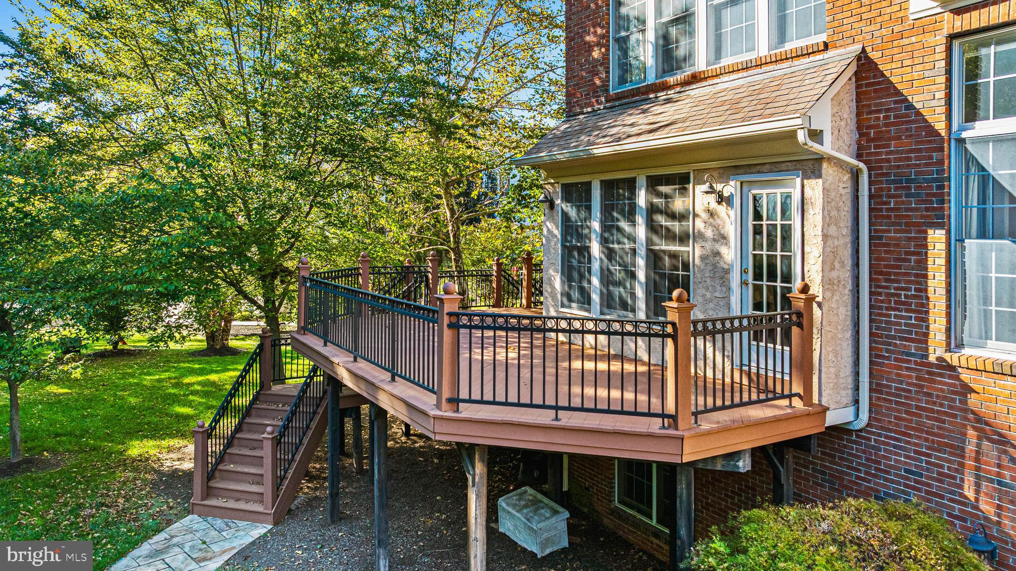 6 Howell Court Princeton Junction, NJ 08550 - Photo 70 of 81 a view of a wooden deck with a bench