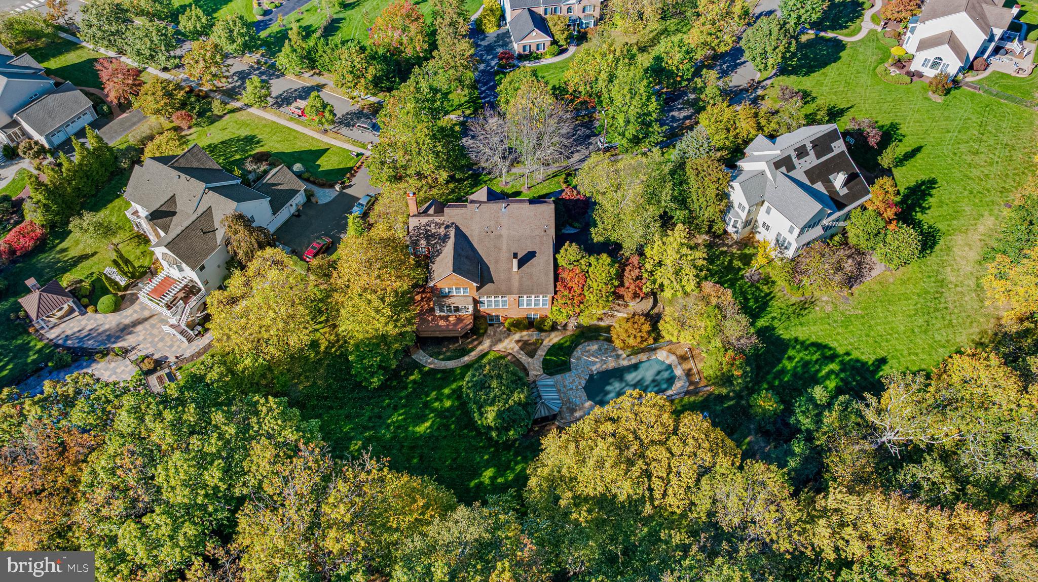 6 Howell Court Princeton Junction, NJ 08550 - Photo 78 of 81 an aerial view of a house with a yard and swimming pool