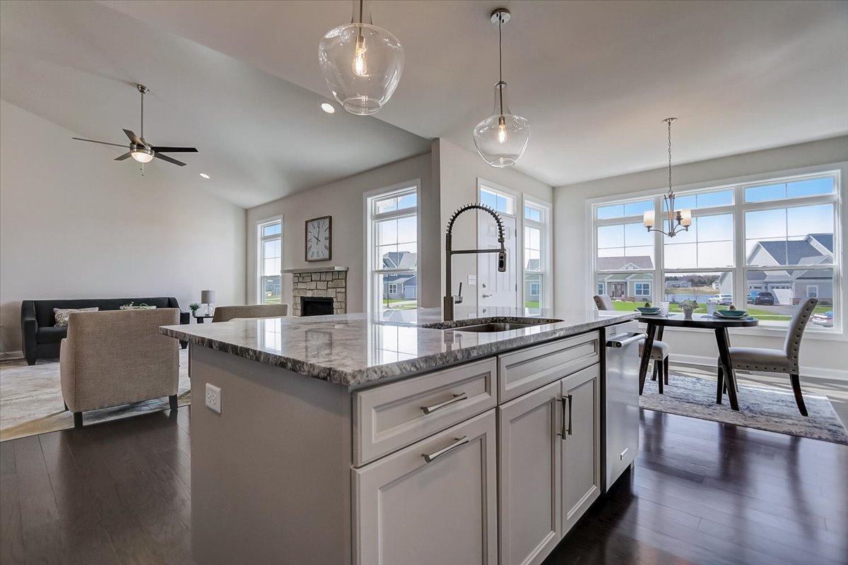 39-w553 Carl Sandburg Road St. Charles, IL 60175 - Photo 11 of 49 a large kitchen with a center island and stainless steel appliances