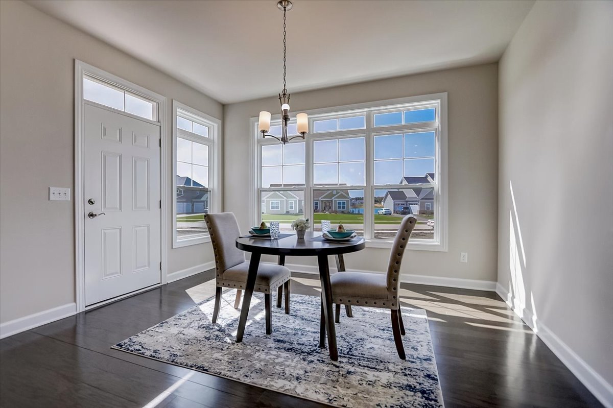 39-w553 Carl Sandburg Road St. Charles, IL 60175 - Photo 16 of 49 a view of a dining room with furniture window and wooden floor