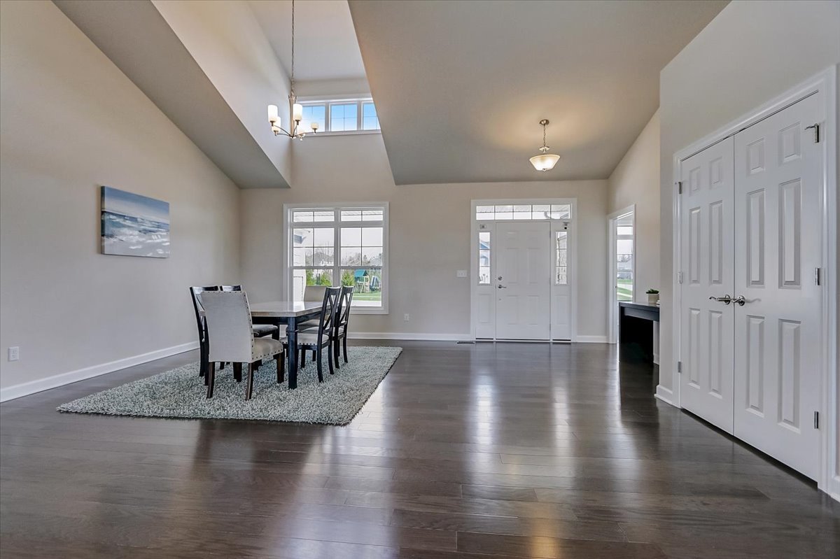 39-w553 Carl Sandburg Road St. Charles, IL 60175 - Photo 19 of 49 a view of a dining room with furniture and chandelier