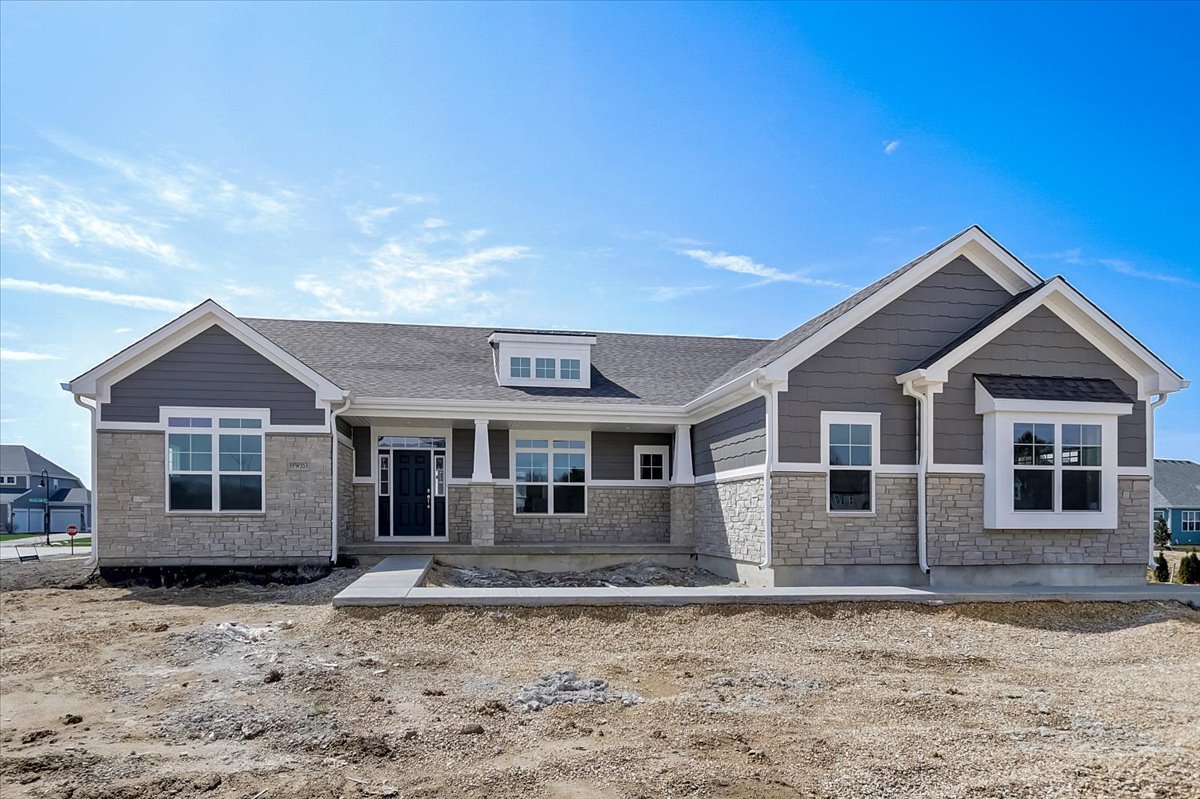 39-w553 Carl Sandburg Road St. Charles, IL 60175 - Photo 2 of 49 a front view of a house with a yard