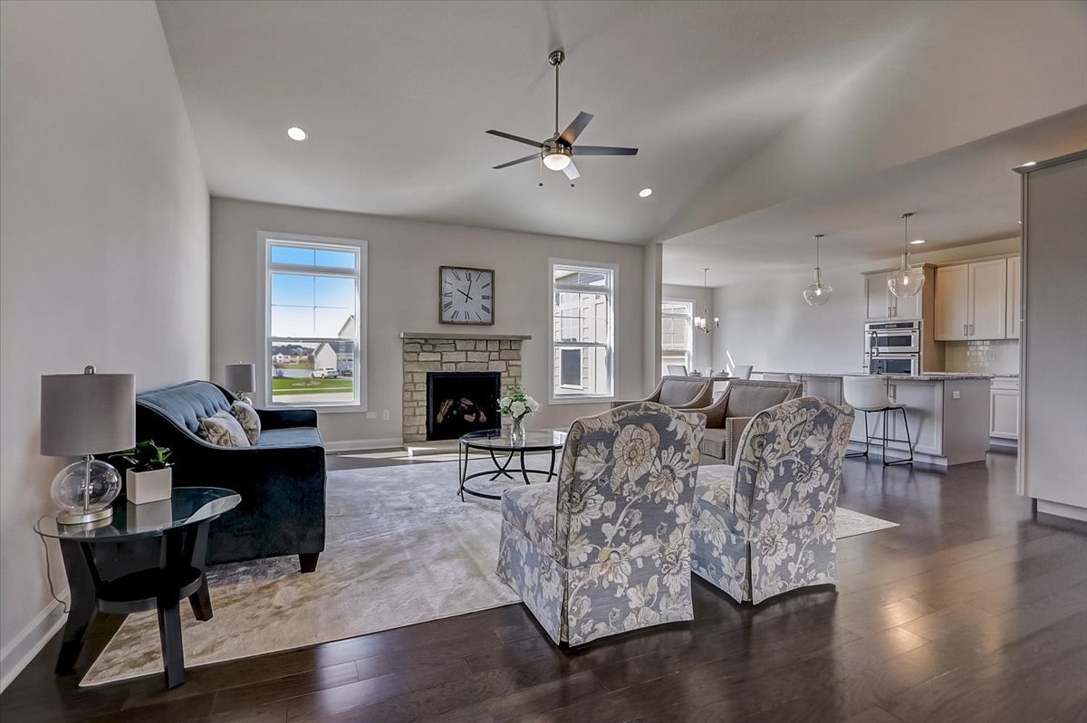 39-w553 Carl Sandburg Road St. Charles, IL 60175 - Photo 22 of 49 a living room with furniture a fireplace and a table