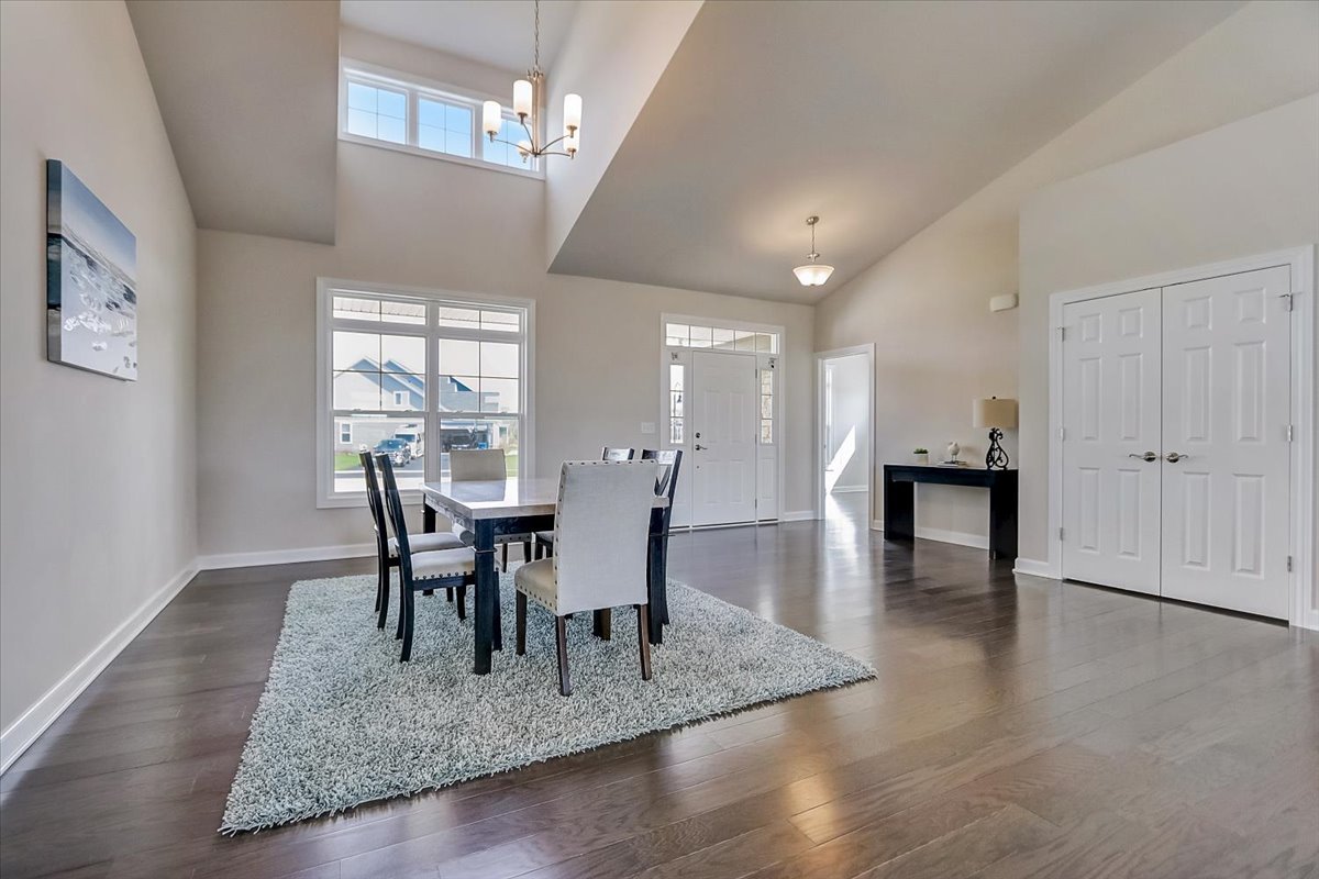 39-w553 Carl Sandburg Road St. Charles, IL 60175 - Photo 26 of 49 a view of a dining room with furniture and wooden floor