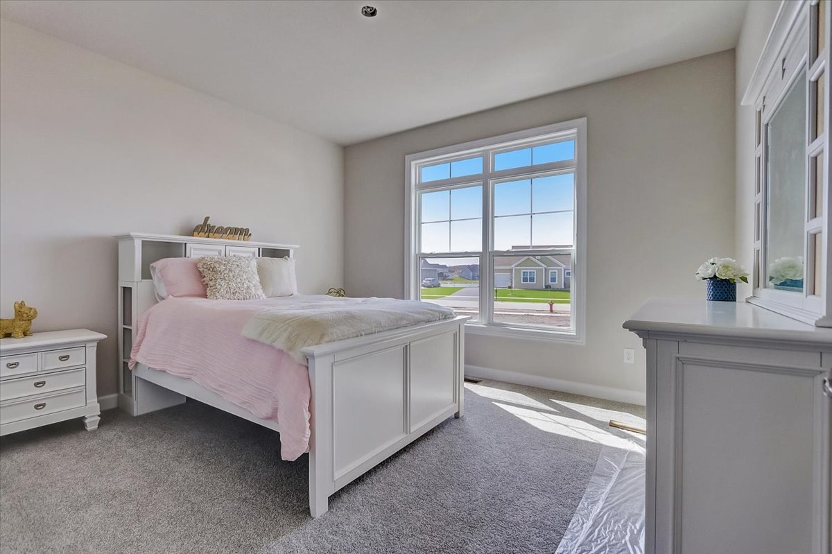 39-w553 Carl Sandburg Road St. Charles, IL 60175 - Photo 28 of 49 a bedroom with a bed and a window