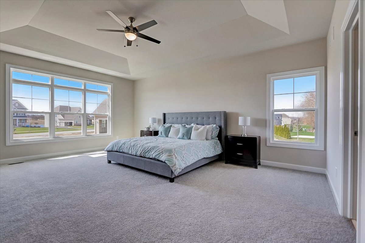 39-w553 Carl Sandburg Road St. Charles, IL 60175 - Photo 35 of 49 a spacious bedroom with a bed and a window