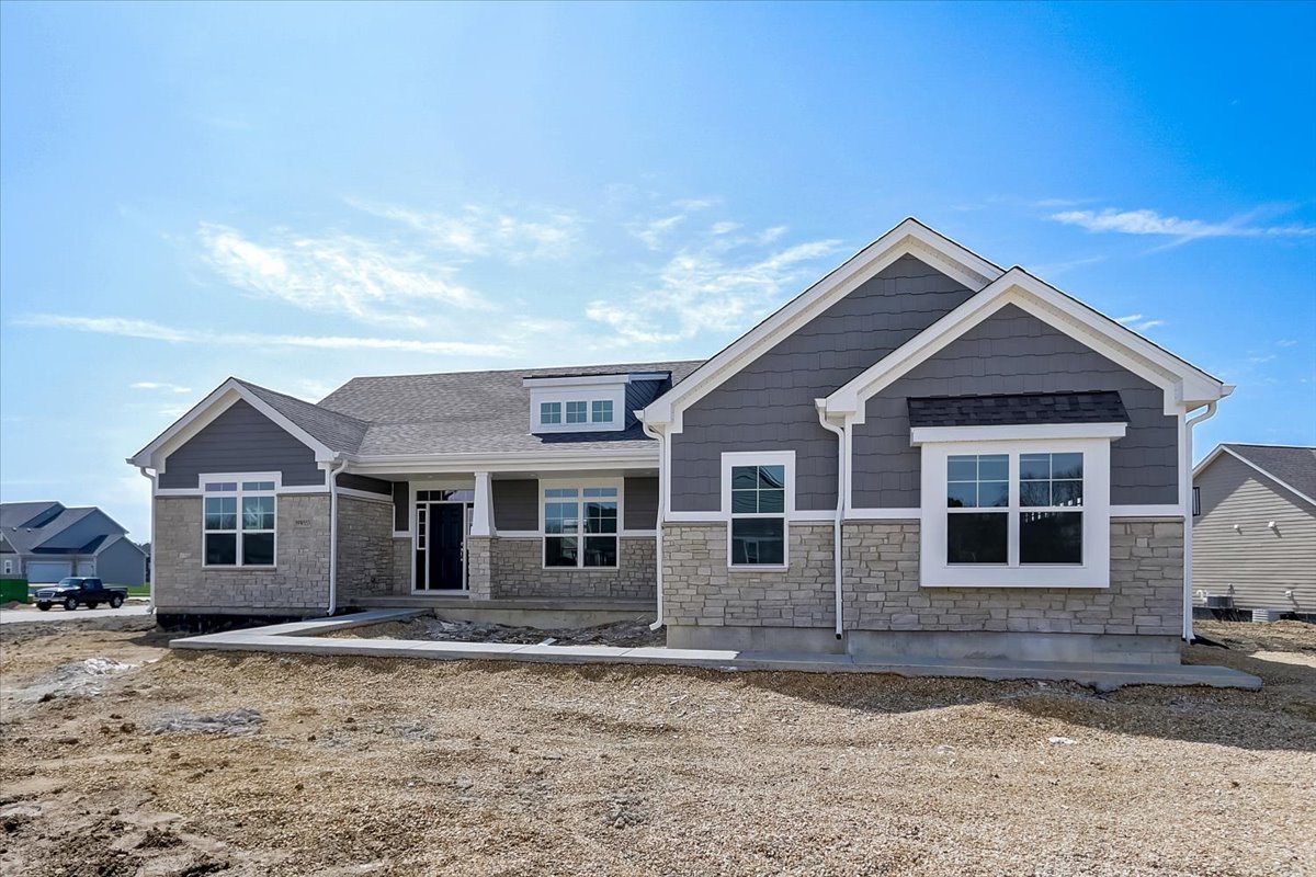 39-w553 Carl Sandburg Road St. Charles, IL 60175 - Photo 5 of 49 a front view of a house with a yard