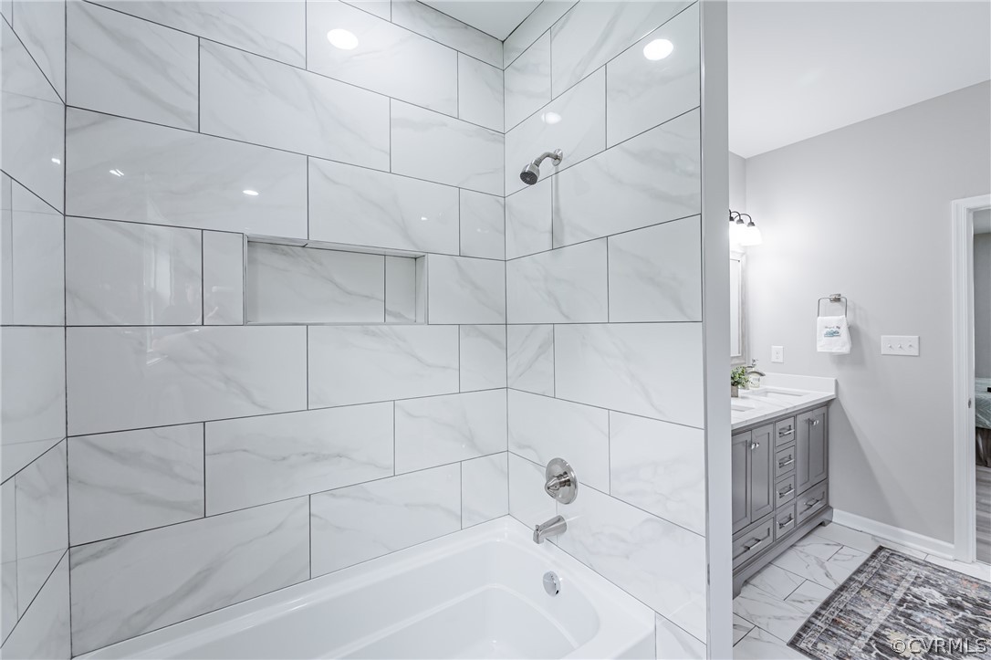 3163 Sandy Hook Road Sandy Hook, VA 23153 - Photo 16 of 37 a bathroom with a bathtub and shower