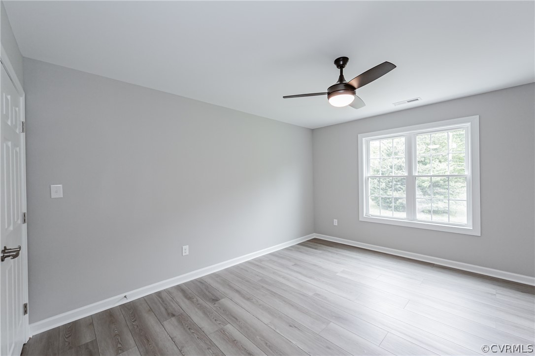 3163 Sandy Hook Road Sandy Hook, VA 23153 - Photo 22 of 37 a view of an empty room with a window