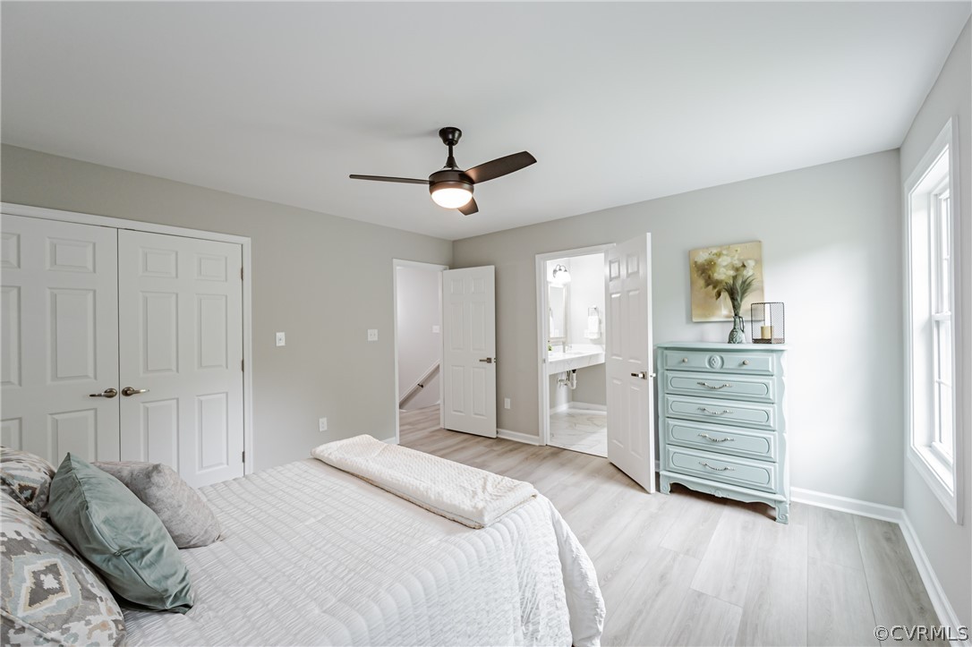 3163 Sandy Hook Road Sandy Hook, VA 23153 - Photo 24 of 37 a bedroom with a bed and a ceiling fan