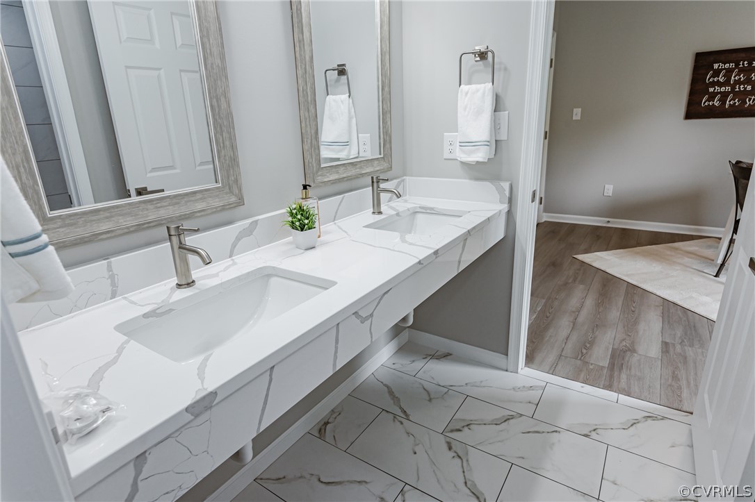3163 Sandy Hook Road Sandy Hook, VA 23153 - Photo 25 of 37 a bathroom with a sink and a mirror