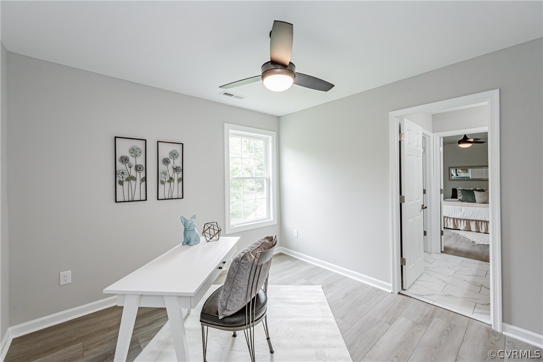 3163 Sandy Hook Road Sandy Hook, VA 23153 - Photo 27 of 37 a view of a dining room with furniture and chandelier