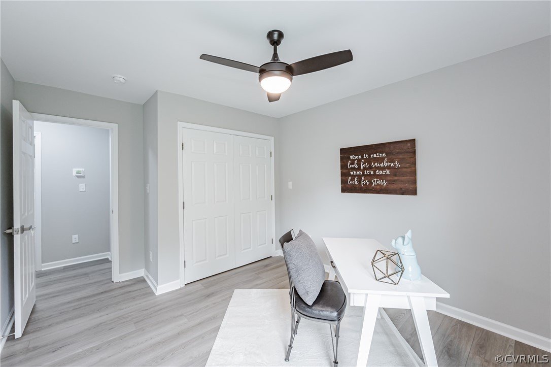 3163 Sandy Hook Road Sandy Hook, VA 23153 - Photo 28 of 37 a view of a workspace with furniture and wooden floor