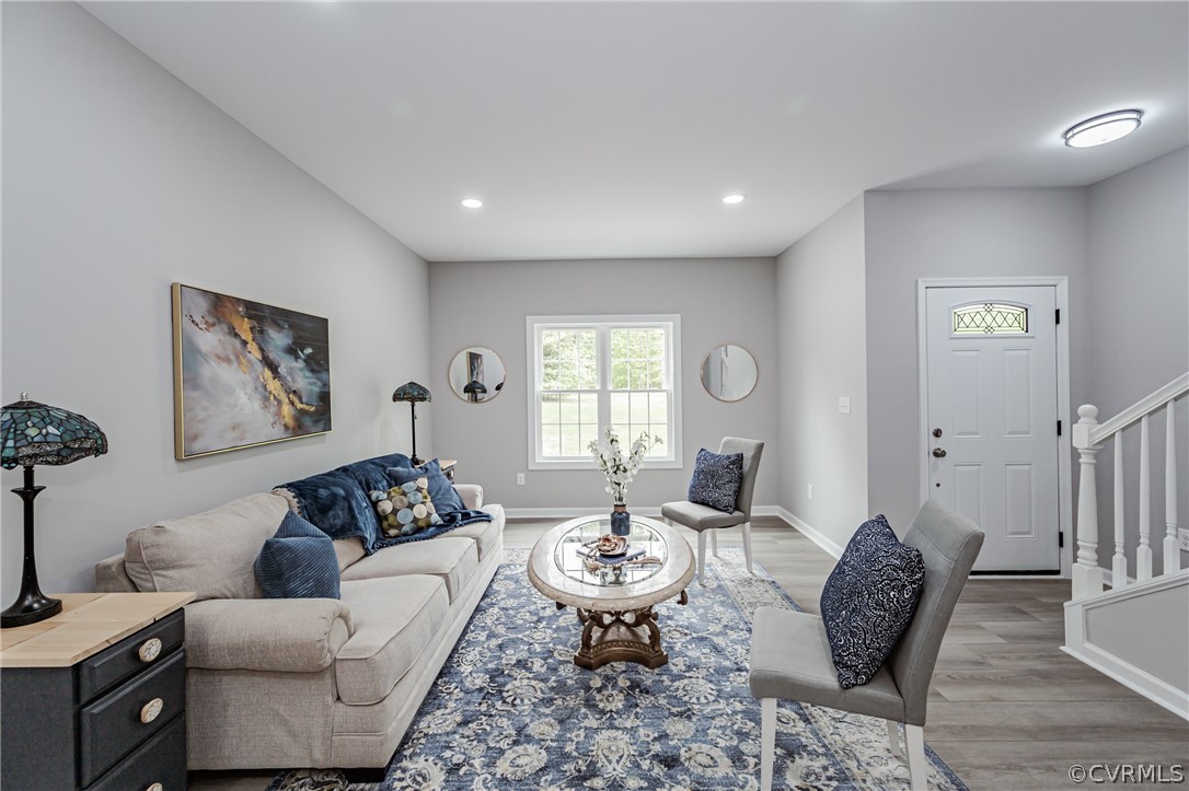 3163 Sandy Hook Road Sandy Hook, VA 23153 - Photo 3 of 37 a living room with furniture and a large window