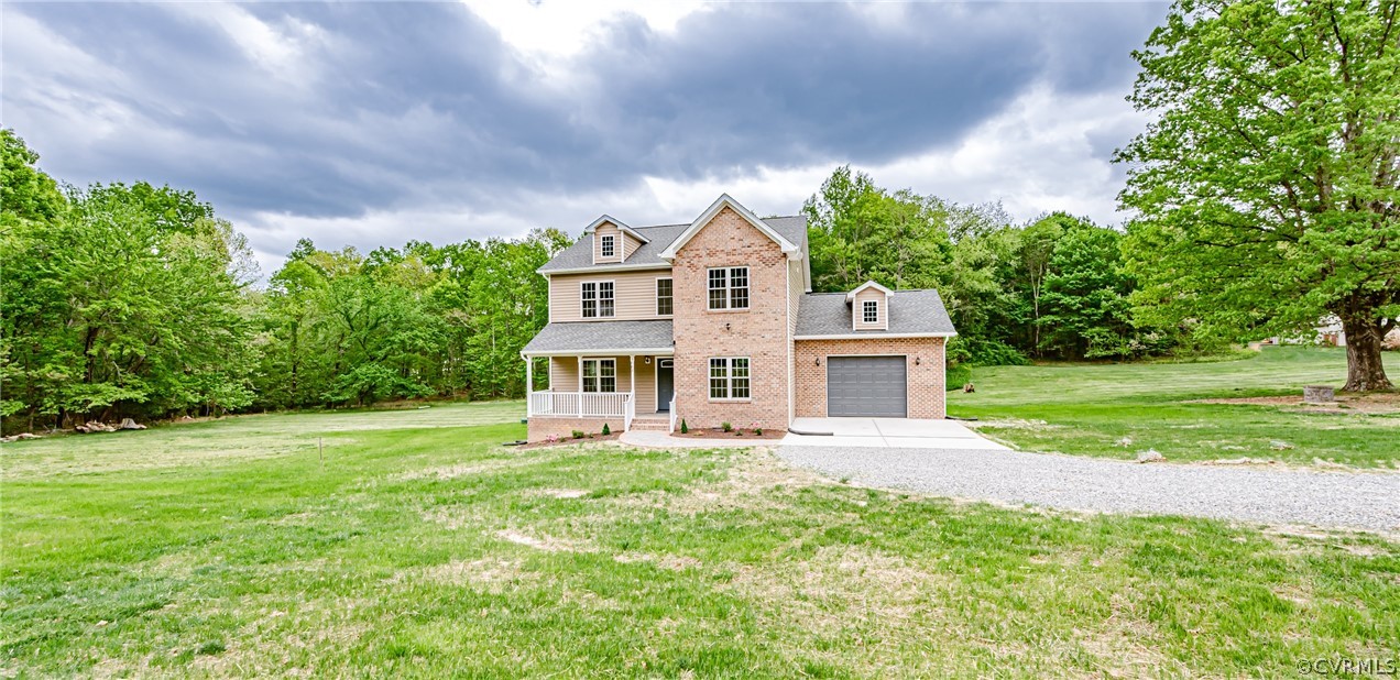 3163 Sandy Hook Road Sandy Hook, VA 23153 - Photo 37 of 37 a house view with a garden space