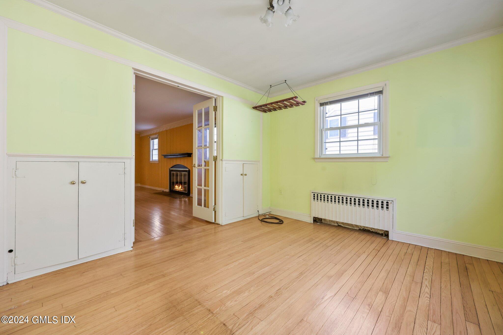 6 Center Road Old Greenwich, CT 06870 - Photo 11 of 47 a view of a room with wooden floor and cabinet