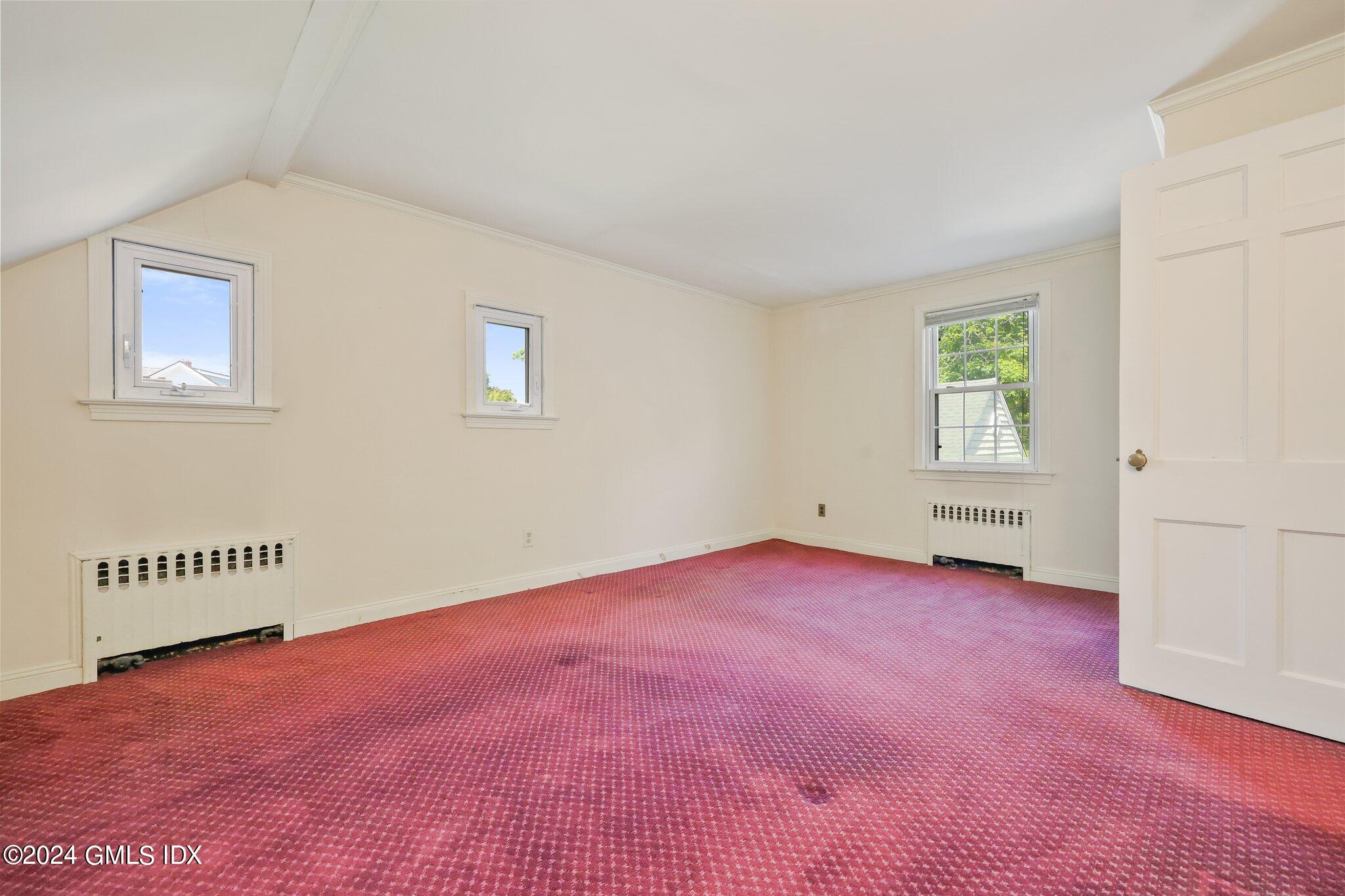 6 Center Road Old Greenwich, CT 06870 - Photo 19 of 47 an empty room with windows