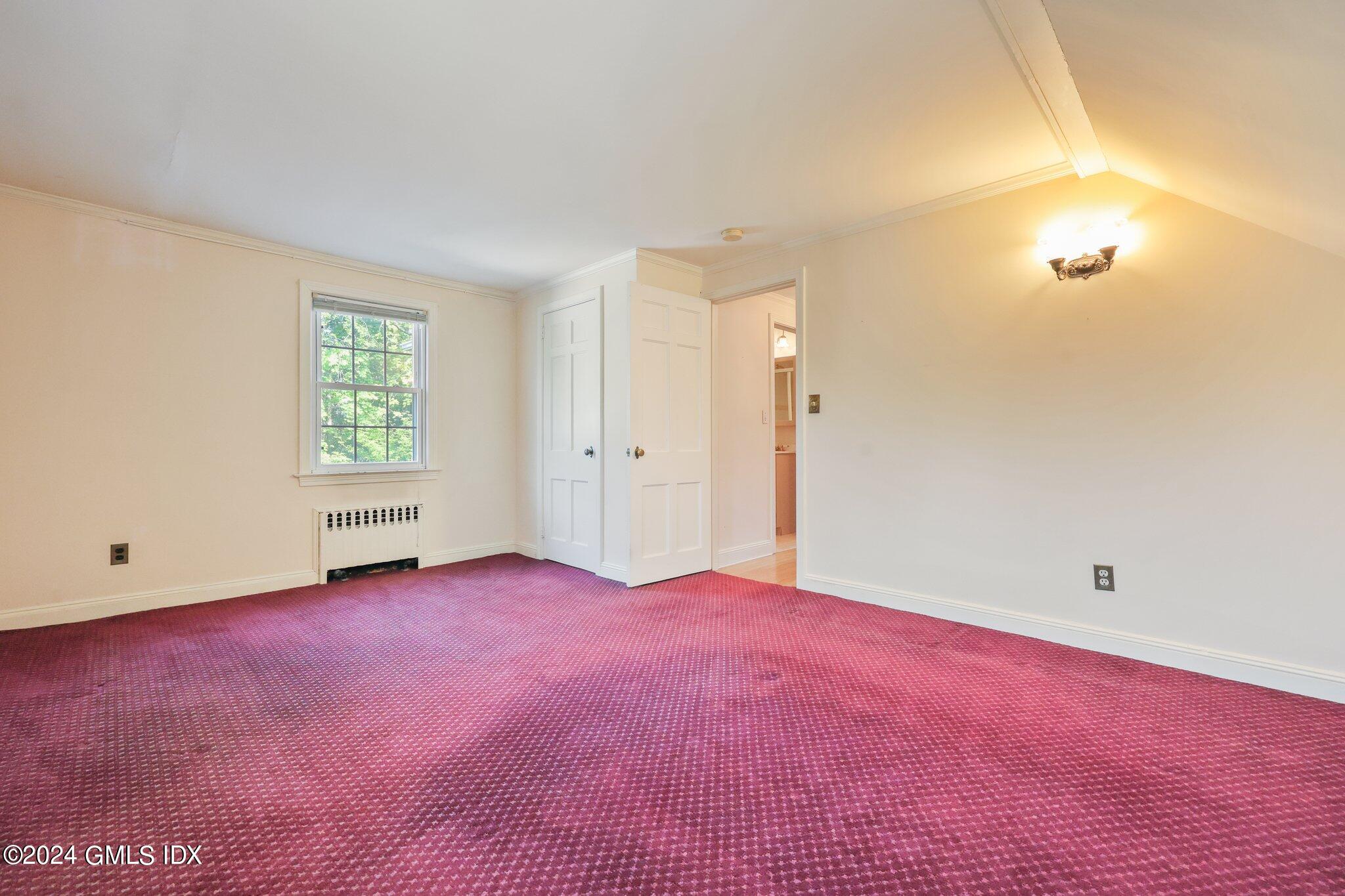 6 Center Road Old Greenwich, CT 06870 - Photo 20 of 47 an empty room with windows and closet