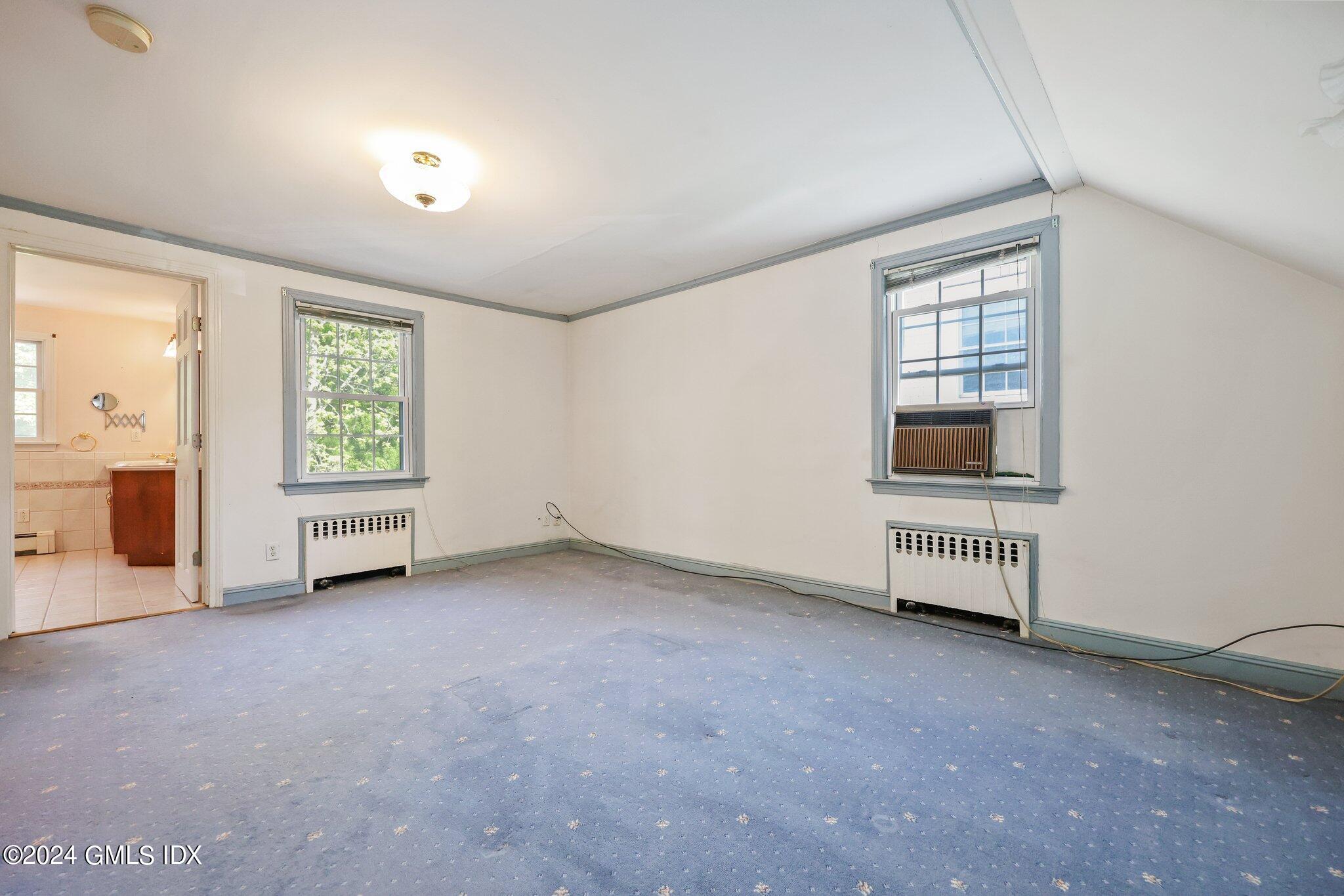 6 Center Road Old Greenwich, CT 06870 - Photo 24 of 47 an empty room with a window