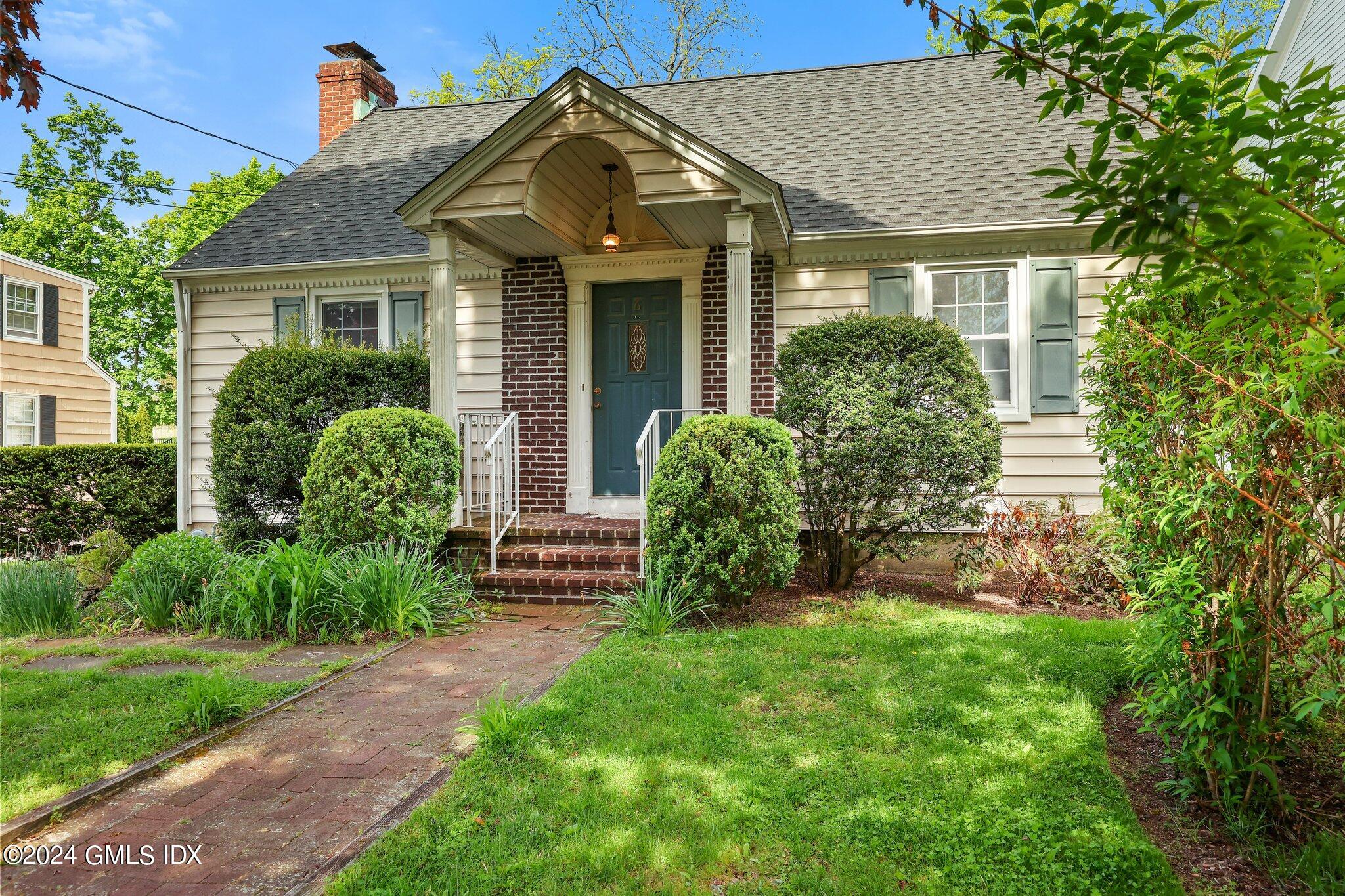 6 Center Road Old Greenwich, CT 06870 - Photo 3 of 47 front view of a house with a yard