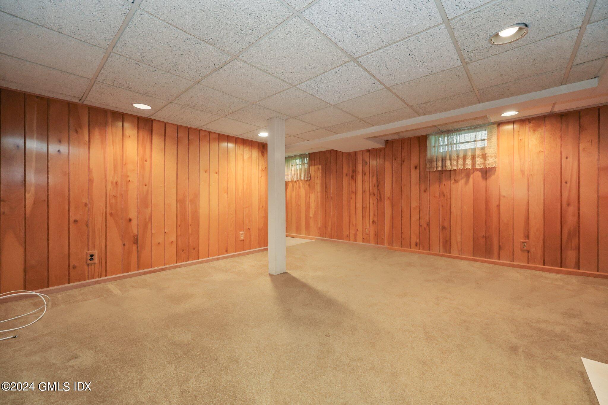 6 Center Road Old Greenwich, CT 06870 - Photo 31 of 47 an empty room with windows