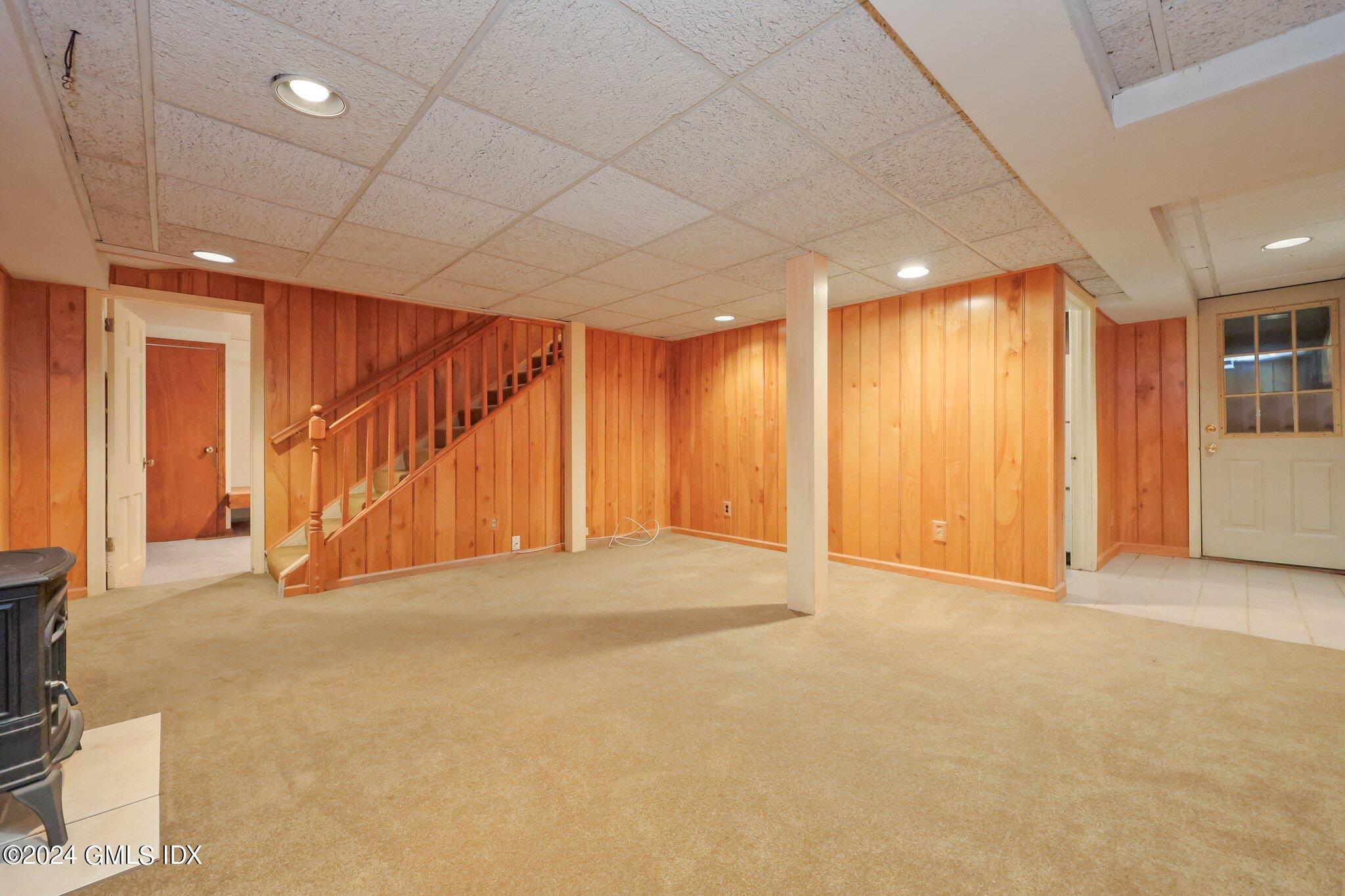 6 Center Road Old Greenwich, CT 06870 - Photo 33 of 47 a view of an empty room with wooden floor