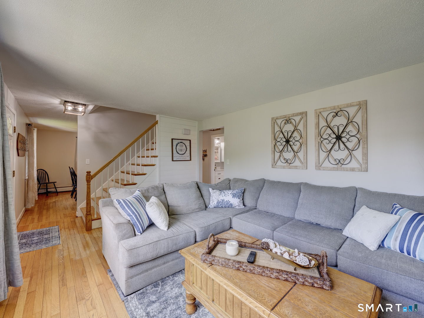 39 Freedom Drive Canton, CT 06019 - Photo 7 of 37 a living room with furniture and wooden floor