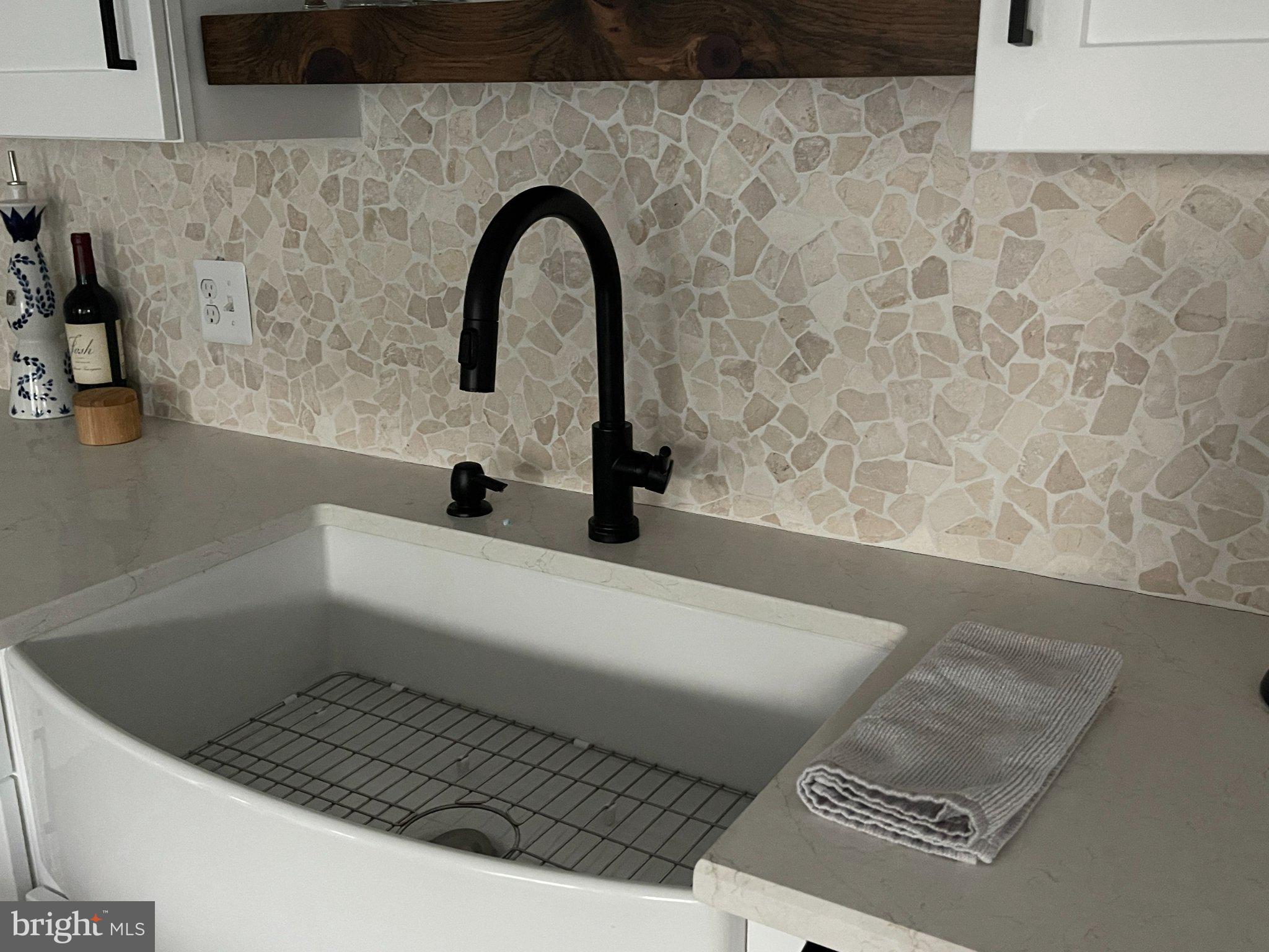 8841 Broomes Island Road Broomes Island, MD 20615 - Photo 7 of 20 Elegant farmhouse sink with modern faucet.