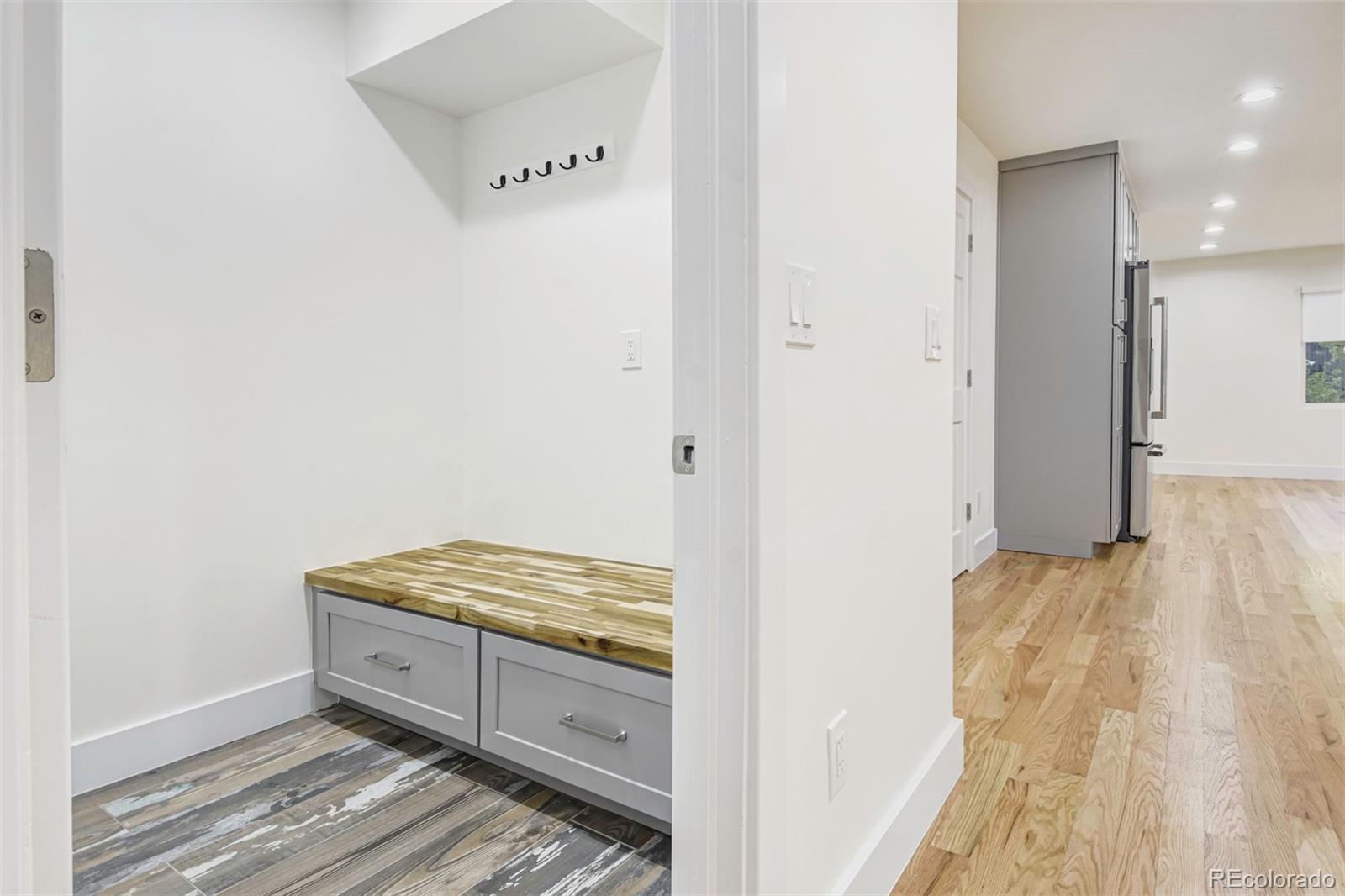 6107 Old Brompton Road Boulder, CO 80301 - Photo 15 of 40 a view of walk in closet with clothes