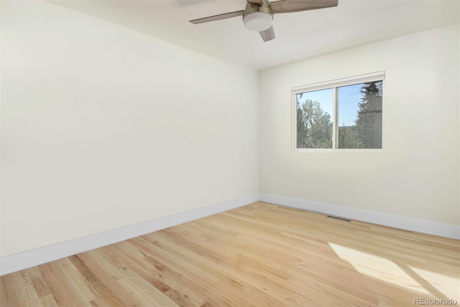 6107 Old Brompton Road Boulder, CO 80301 - Photo 24 of 40 an empty room with a window and a fan