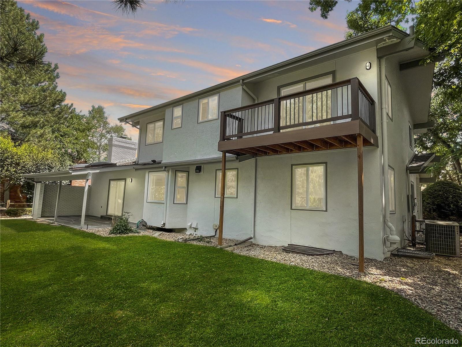 6107 Old Brompton Road Boulder, CO 80301 - Photo 30 of 40 front view of a house with a yard