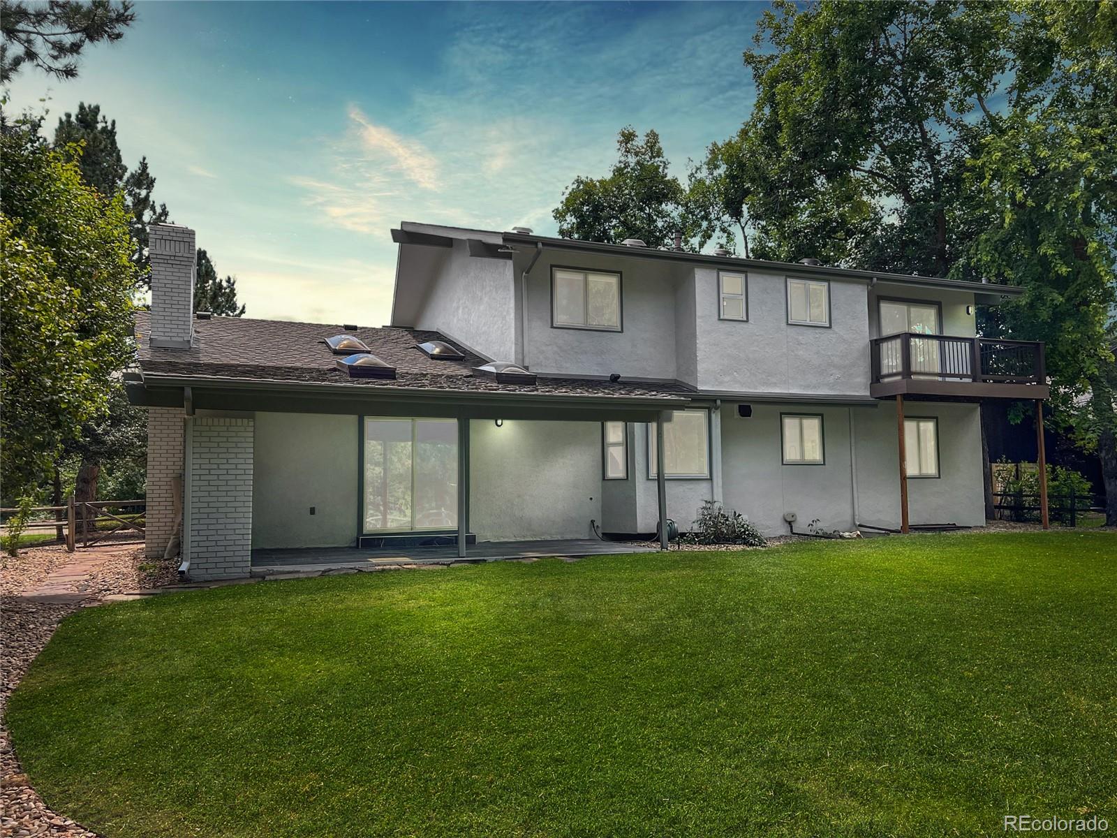 6107 Old Brompton Road Boulder, CO 80301 - Photo 32 of 40 a view of a yard with a house