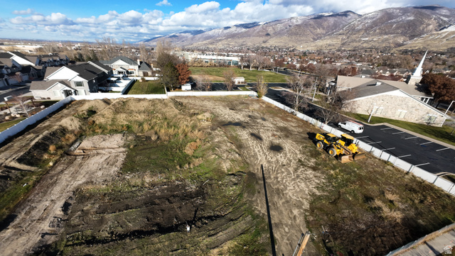 354 South 525th West Centerville, UT 84014 - Photo 3 of 6 Aerial view of residential area featuring a mountain backdrop