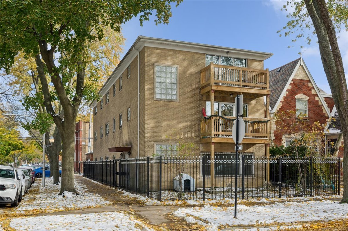 2623 West Arthur Avenue, Unit 1 Chicago, IL 60645 - Photo 1 of 11 a front view of a house