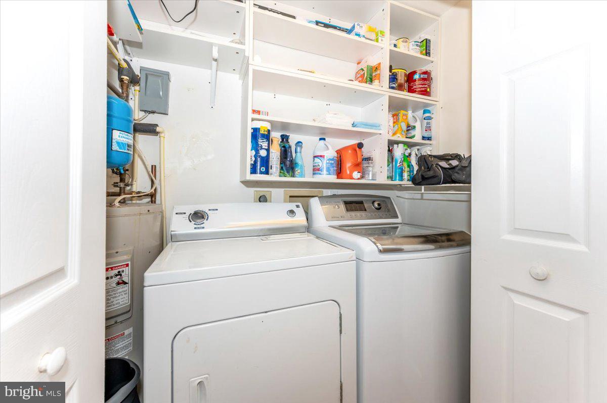 8109 Beverly Road Severn, MD 21144 - Photo 13 of 43 a utility room with dryer and washer