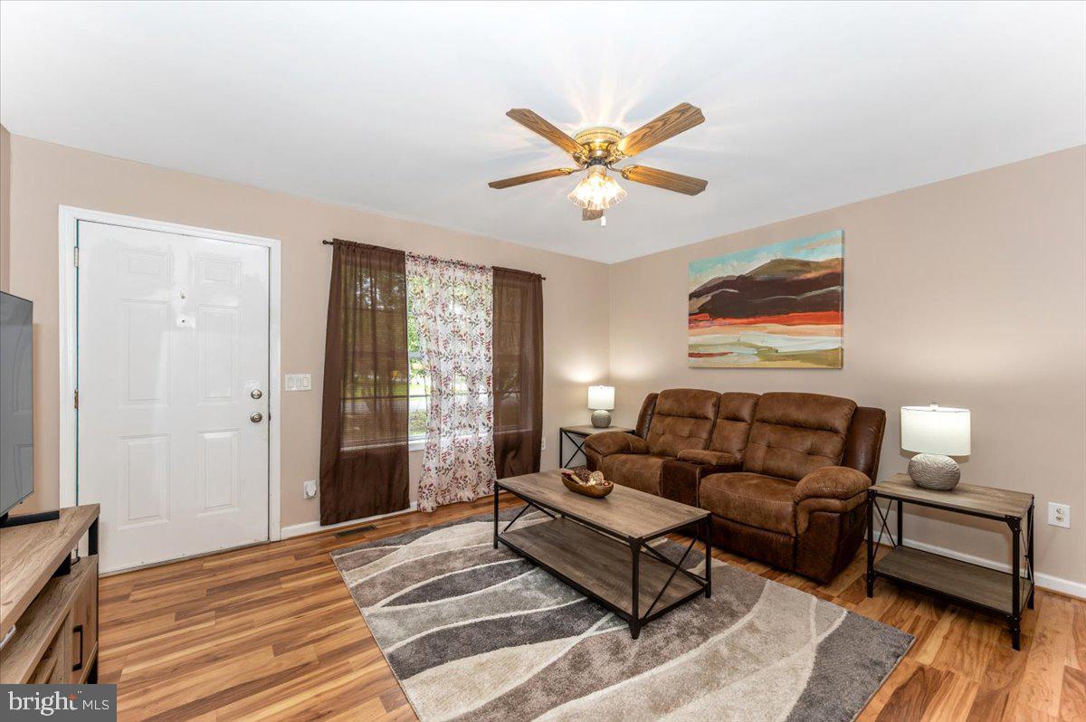 8109 Beverly Road Severn, MD 21144 - Photo 3 of 43 a living room with furniture and a window