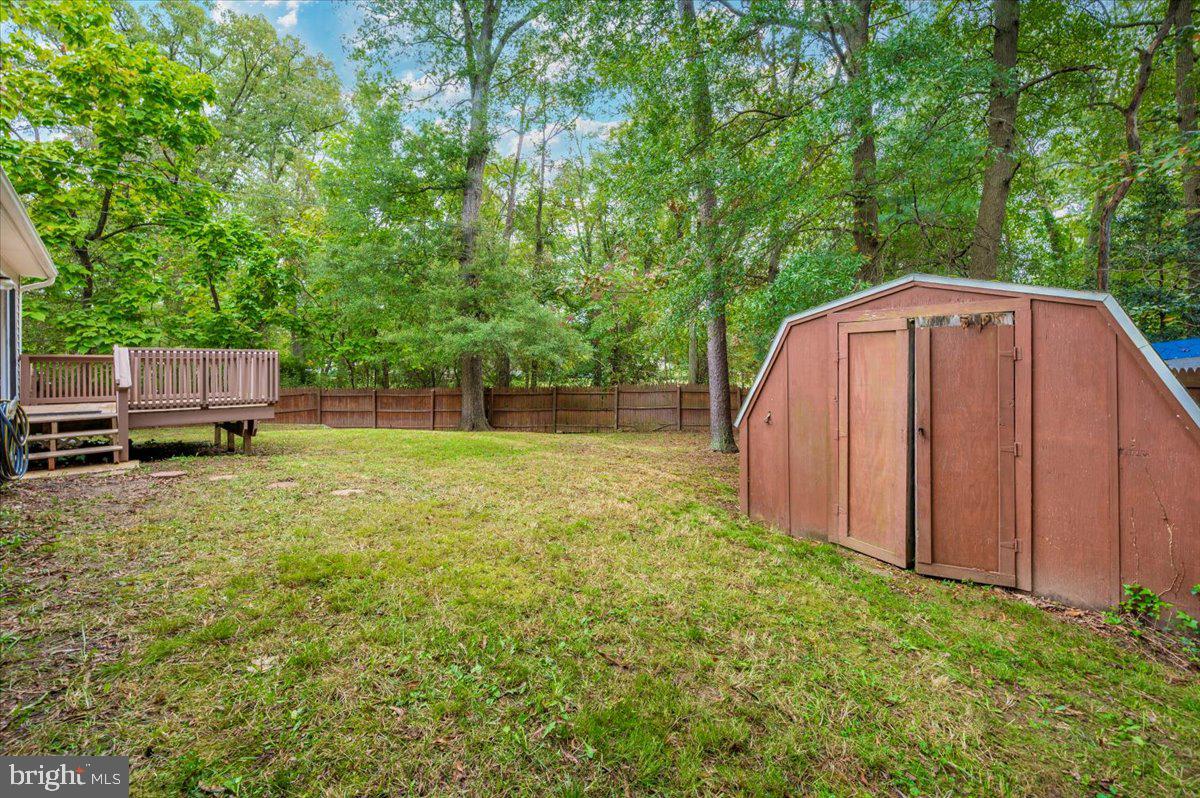 8109 Beverly Road Severn, MD 21144 - Photo 32 of 43 a view of a backyard with sitting area