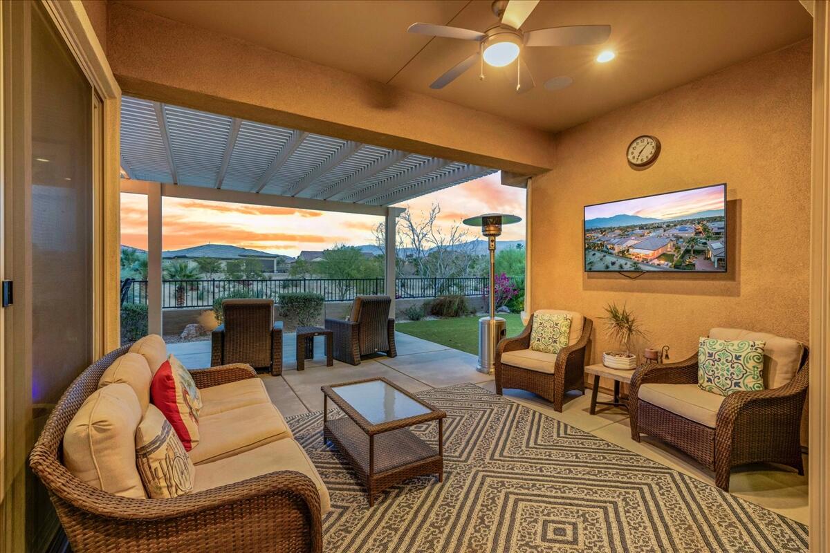 72 Barolo Rancho Mirage, CA 92270 - Photo 11 of 65 a outdoor living space with furniture and garden view