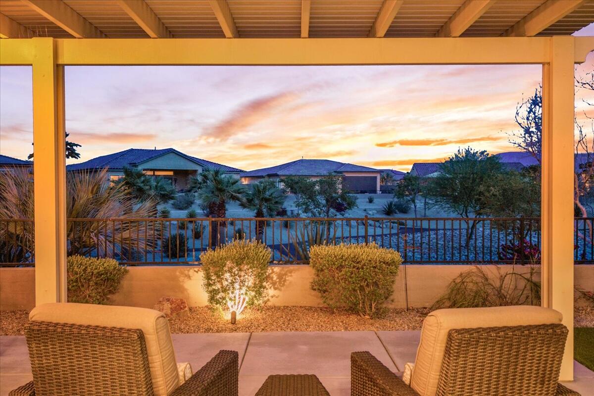 72 Barolo Rancho Mirage, CA 92270 - Photo 15 of 65 a view of a balcony with couches with wooden floor