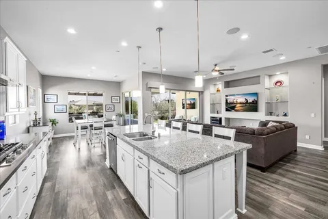 a view of a swimming pool with a yard