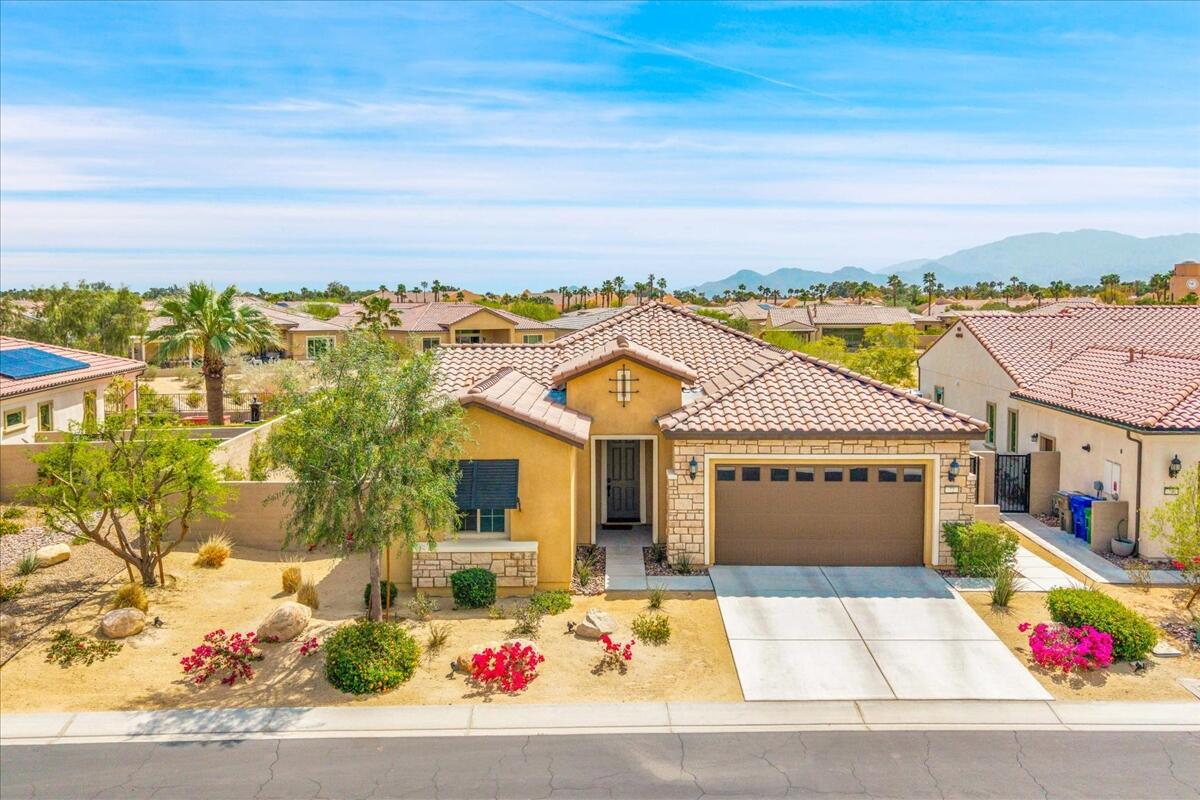 72 Barolo Rancho Mirage, CA 92270 - Photo 45 of 65 front view of house with a swimming pool