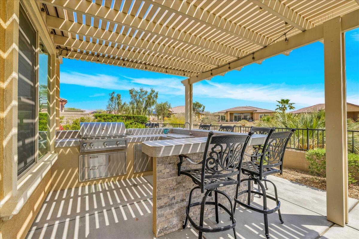 72 Barolo Rancho Mirage, CA 92270 - Photo 46 of 65 a view of a swimming pool with outdoor seating