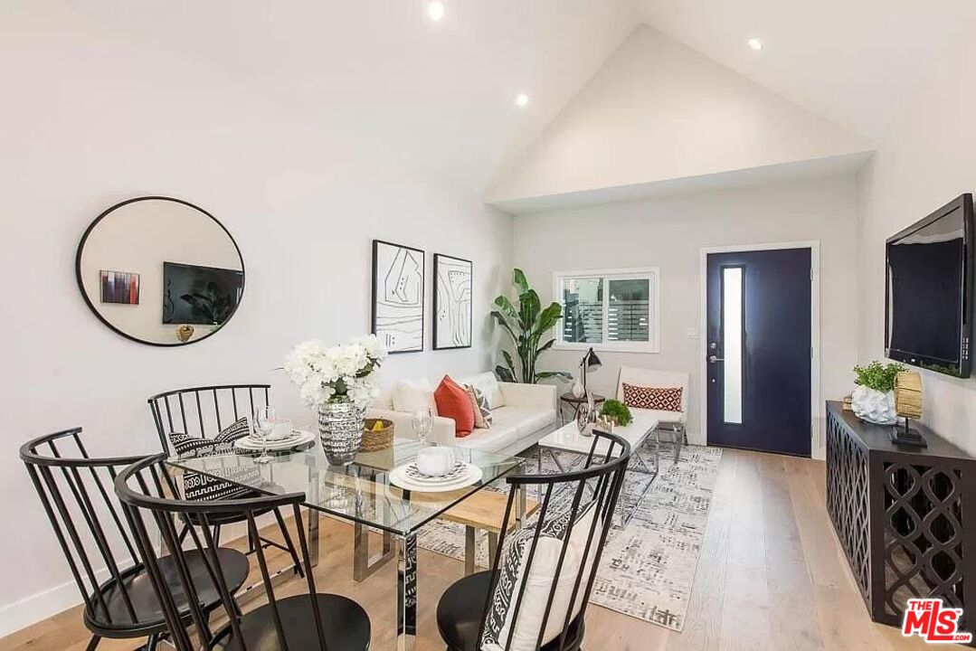 2419 Walnut Avenue Venice, CA 90291 - Photo 5 of 11 a view of a dining room with furniture and a chandelier