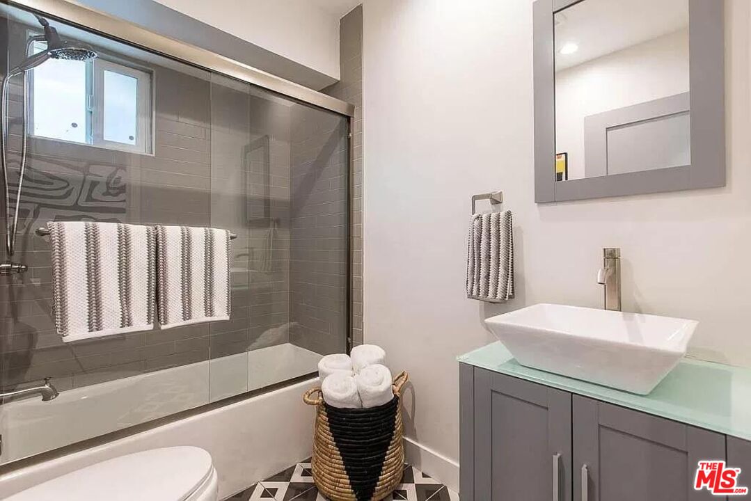 2419 Walnut Avenue Venice, CA 90291 - Photo 8 of 11 a bathroom with a sink toilet and shower