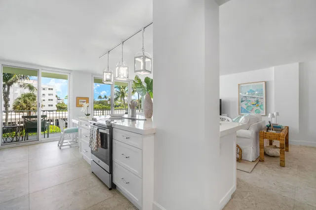 a kitchen with a sink and counter top space